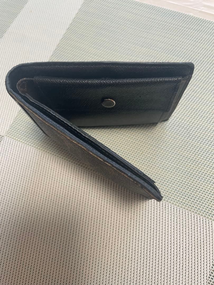 ルイヴィトン モノグラム マカサーポルトフォイユミンドロ 二つ折り財布