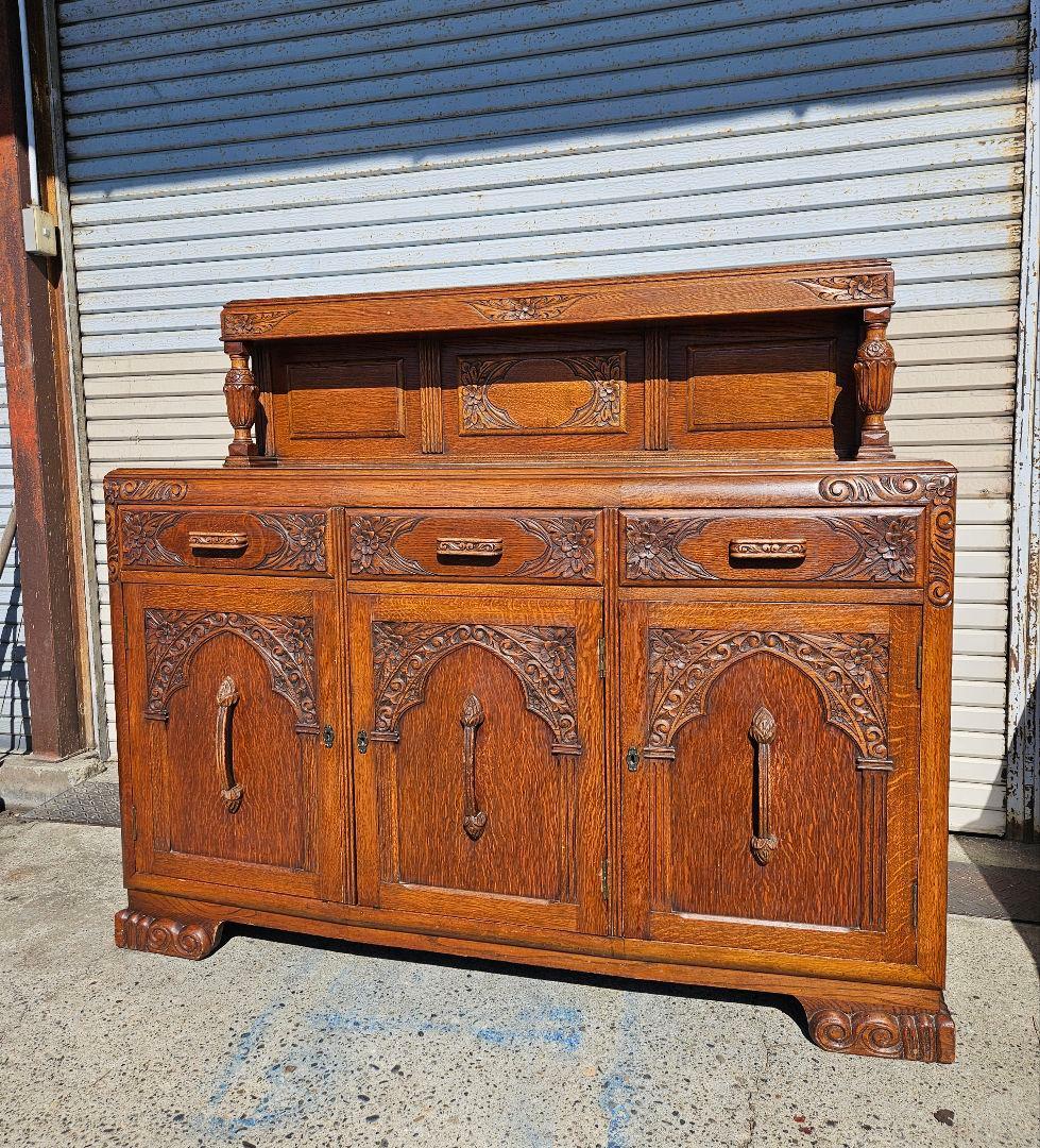 英国アンティーク オーク材のサイドボード バルボス装飾 バフェ 飾り棚 食器棚