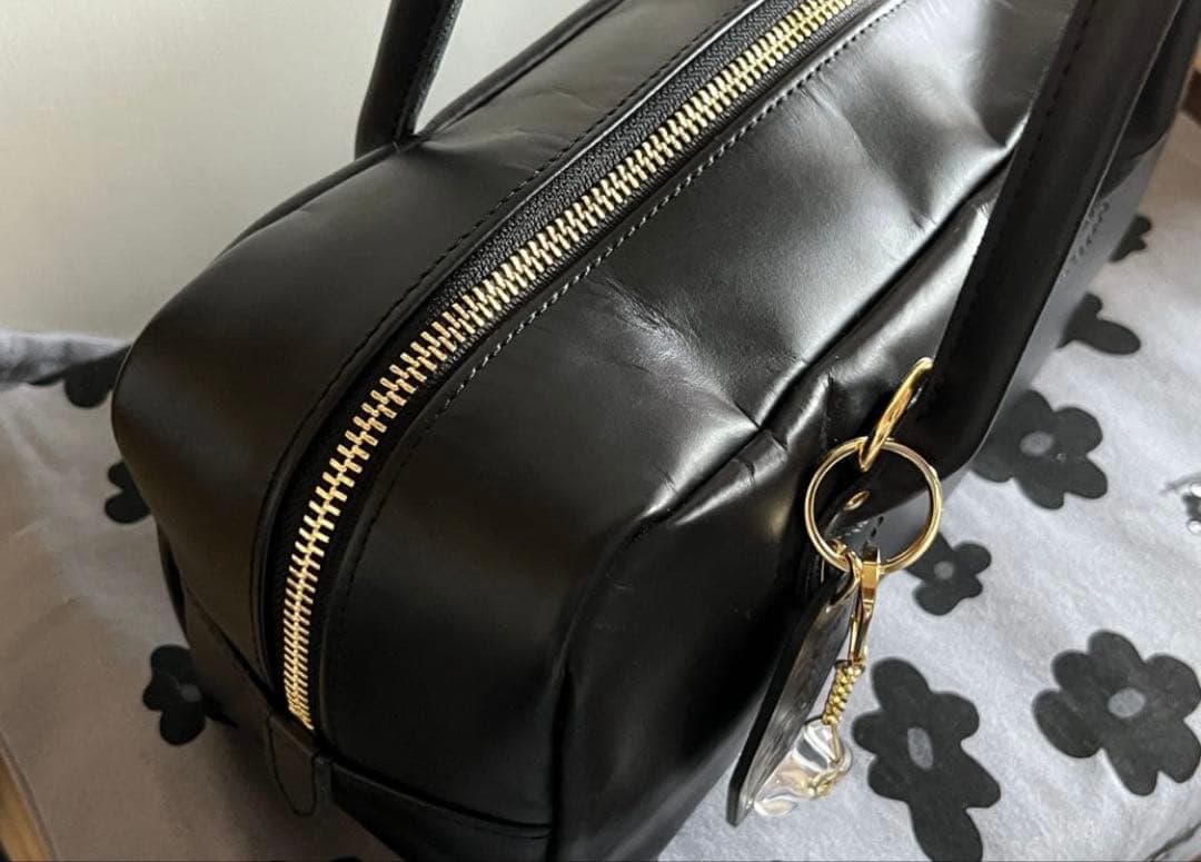 フレームワーク　ヤングアンドオルセン CHARM WIDE BOTTLE BAG
