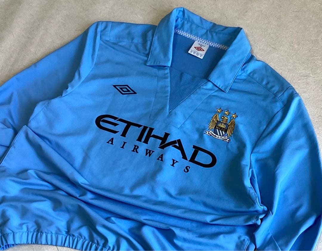 アンブロ　マンチェスターシティ　ドリルトップ　ユニフォーム　オアシス