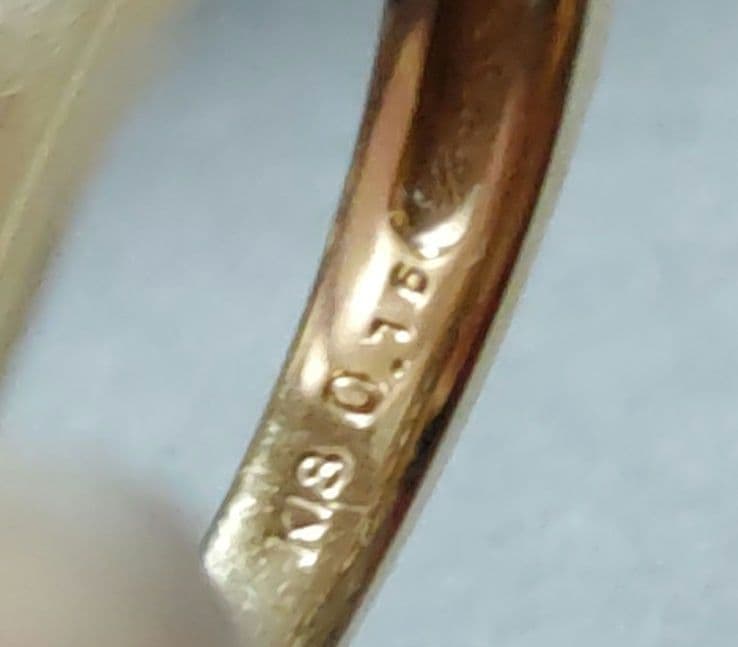 ツツミ　K18ダイヤモンドリング