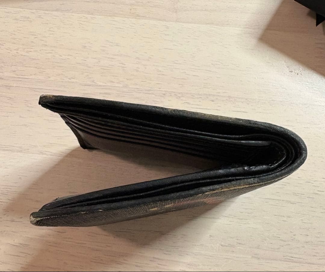 GUCCI 蛇デザイン 二つ折り財布