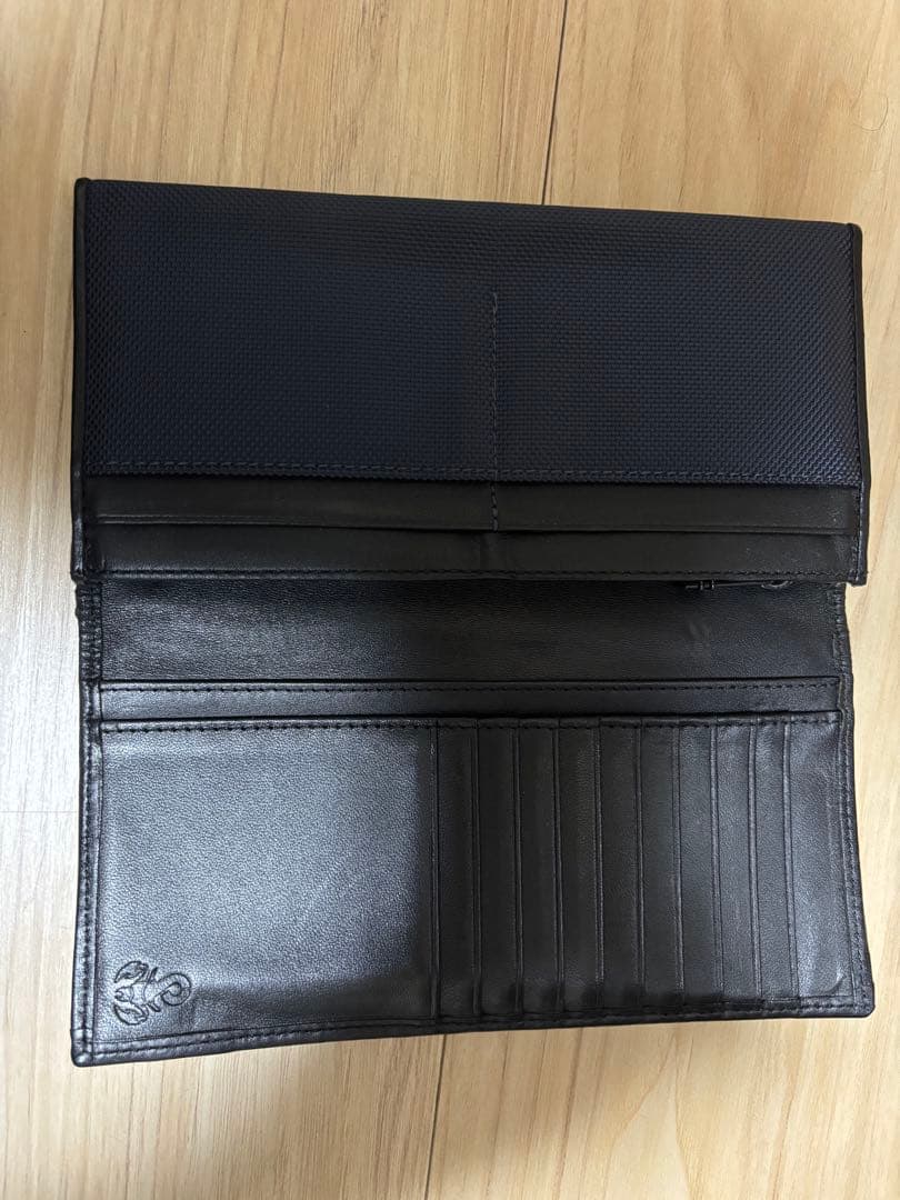 (おし)TUMI SOPHNET. ネイビー 長財布