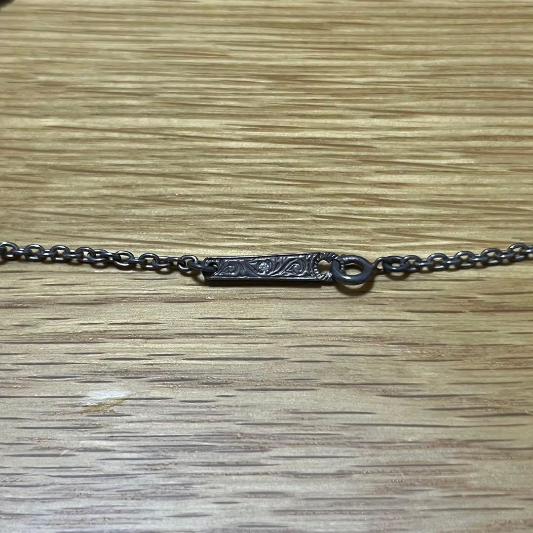 ローリーロドキン　ネックレス/シルバー925/クロス／フェザー／丸型