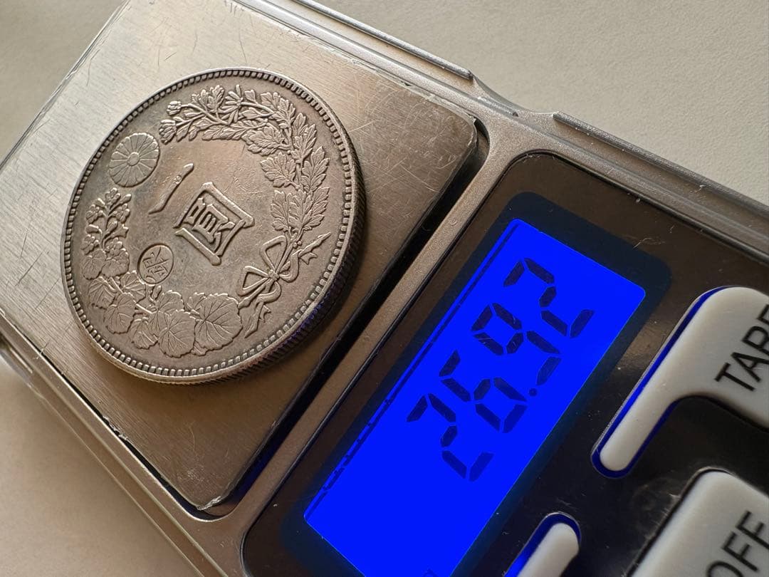 s*e様 【本物保証】　一圓銀貨　丸銀左打　明治23年銘