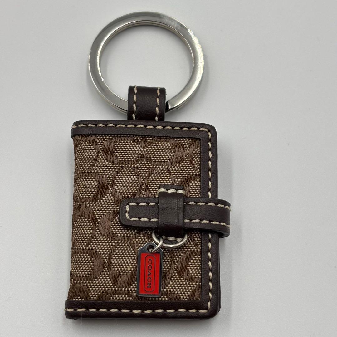 COACH キーホルダー　バッグチャーム　手帳型　フォトフレーム　キーリング