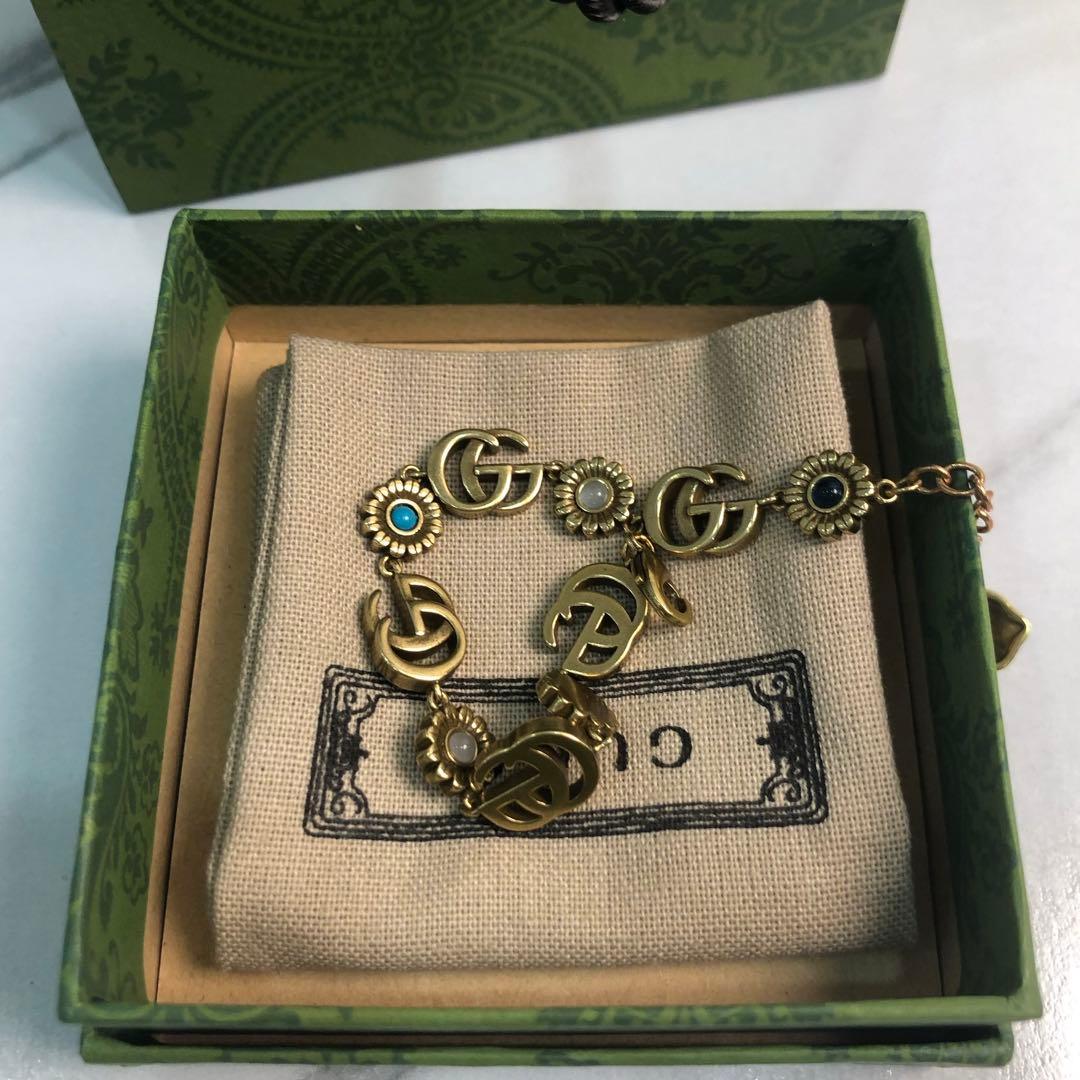 GUCCI GGモチーフ ブレスレット ゴールドカラー フラワーデザイン