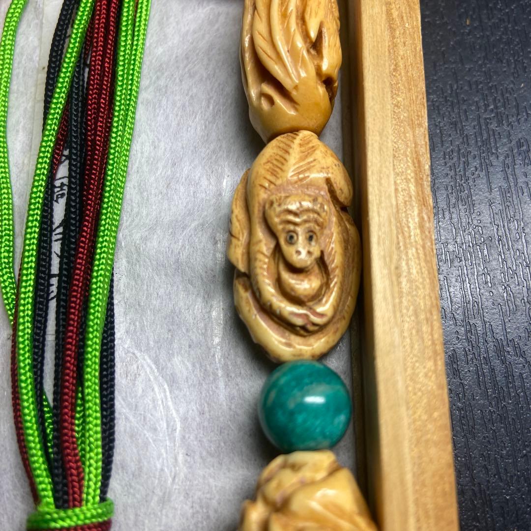 牛骨念珠　十二支彫り