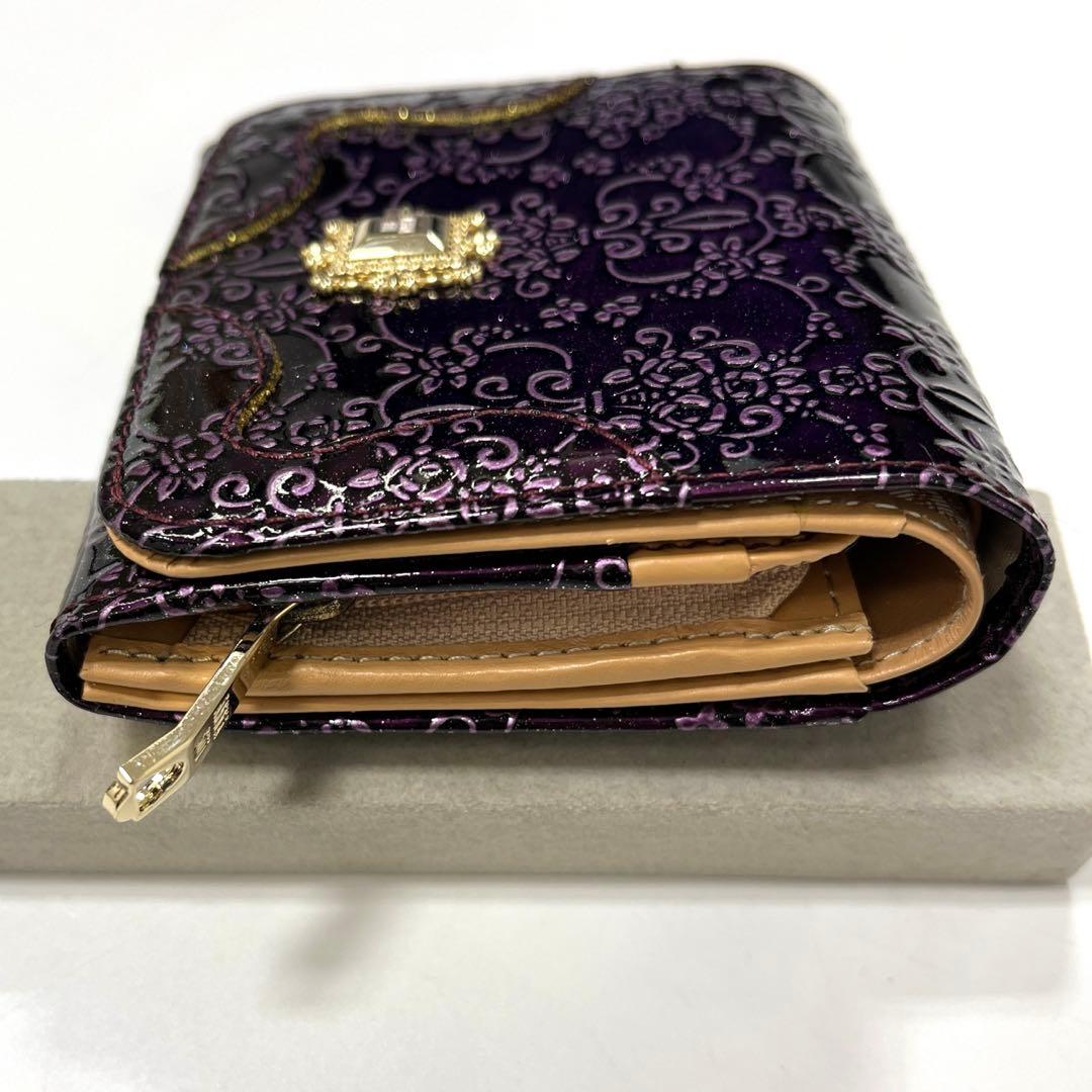 【人気モデル‼︎】ANNA SUI ルーミー　二つ折り財布　薔薇型押し　パープル