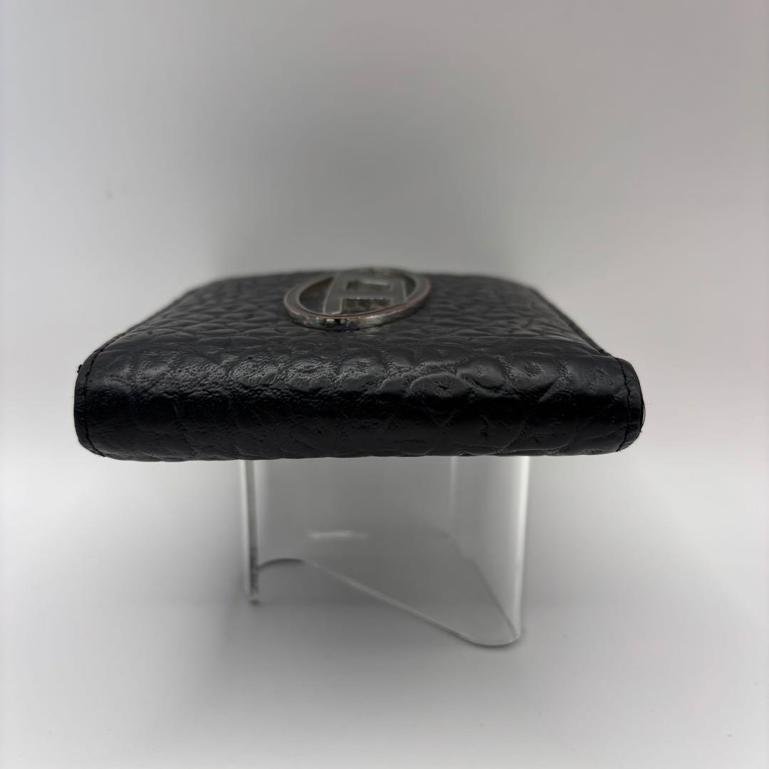 DIESEL 二つ折り財布　ブラック　型押し　D ロゴ　エンボス　シルバー