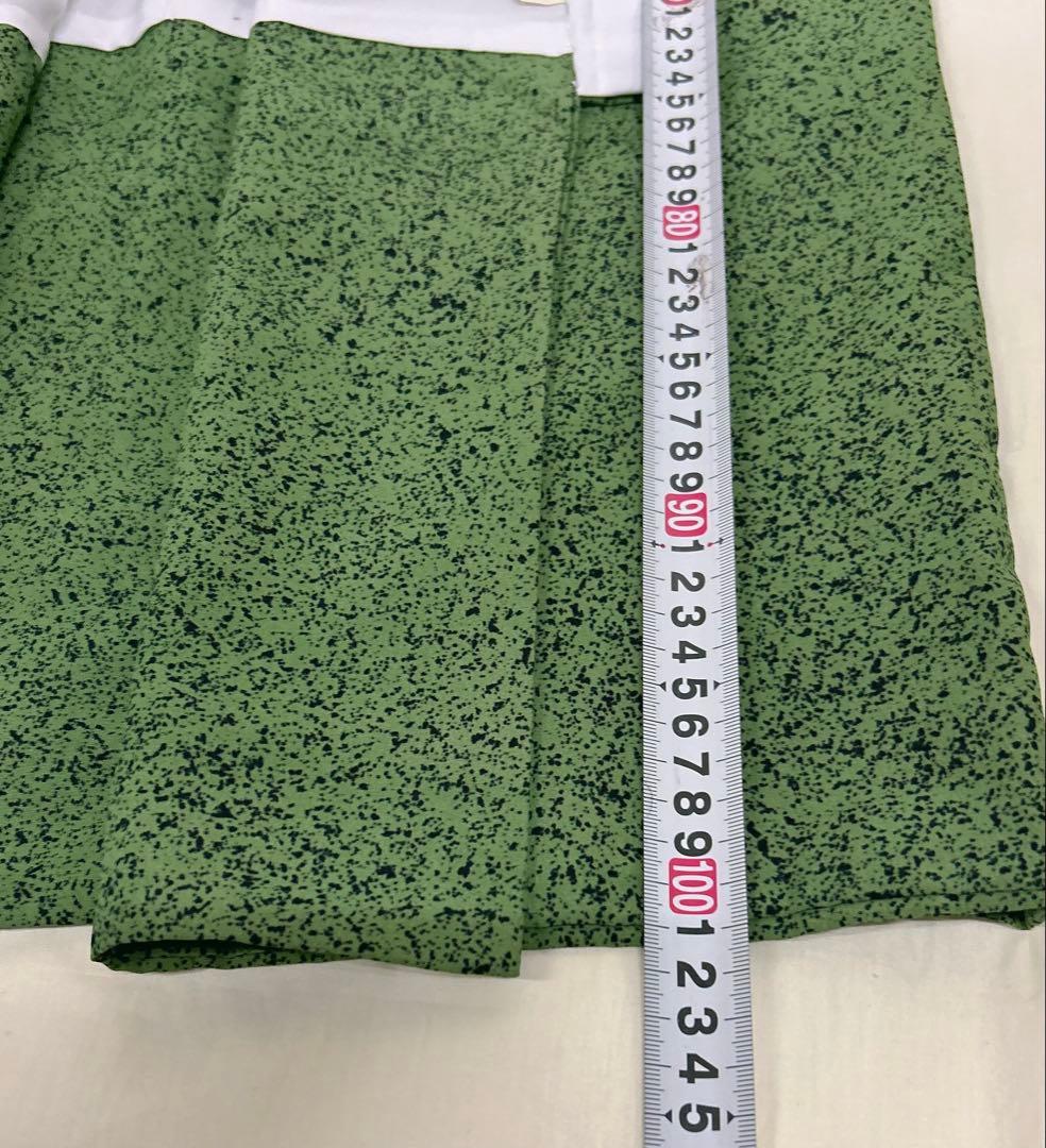 (七五三)7歳前後の男の子向けの、ダークグリーンの着物と羽織、襦袢の3点セット。