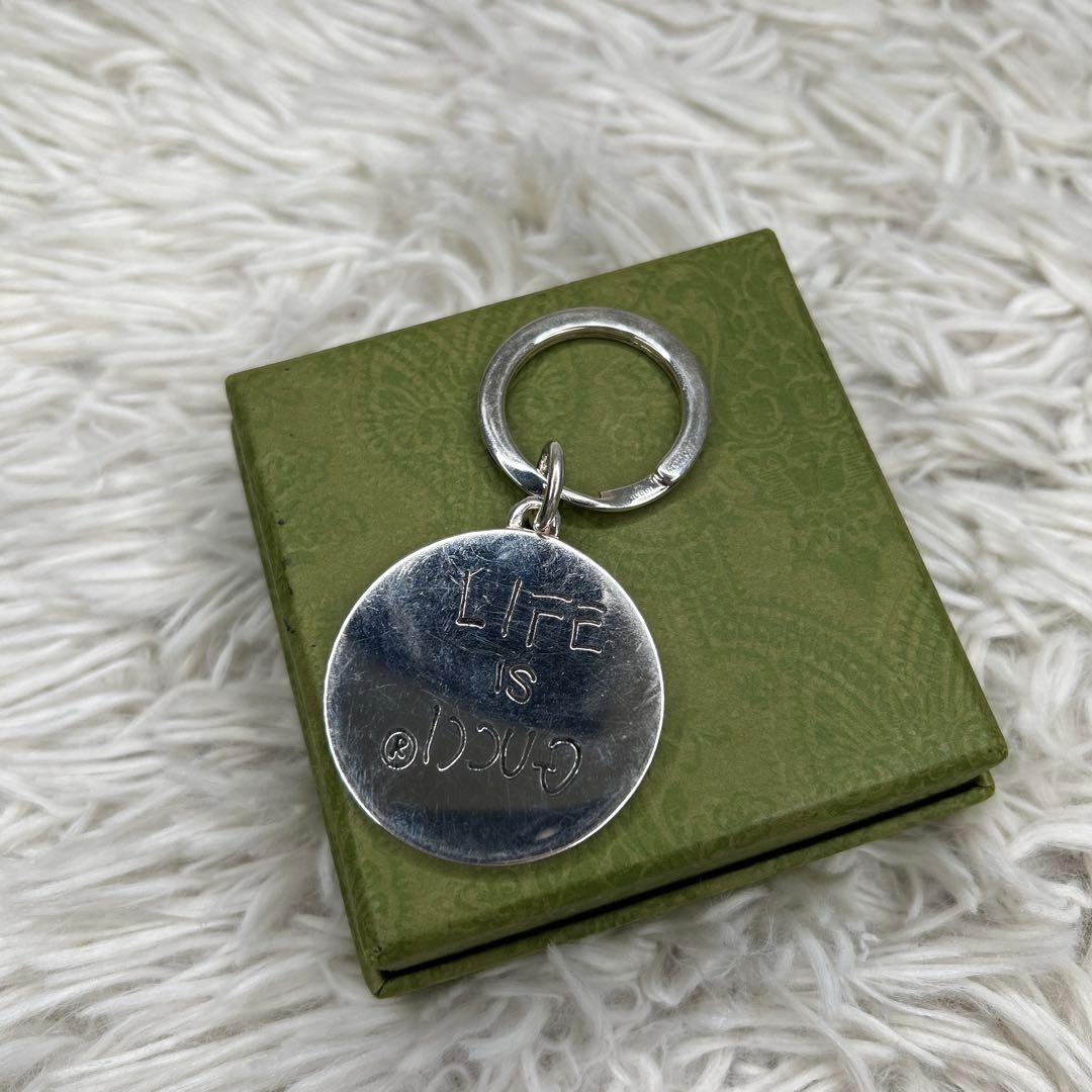 GUCCI REAL キーホルダー　チャーム　ロゴ　シルバー　LIFE IS