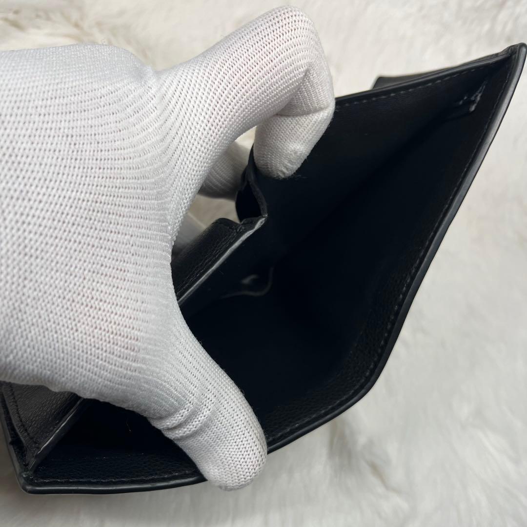 【極美品】COACH黒レザーエンボス加工二つ折り財布