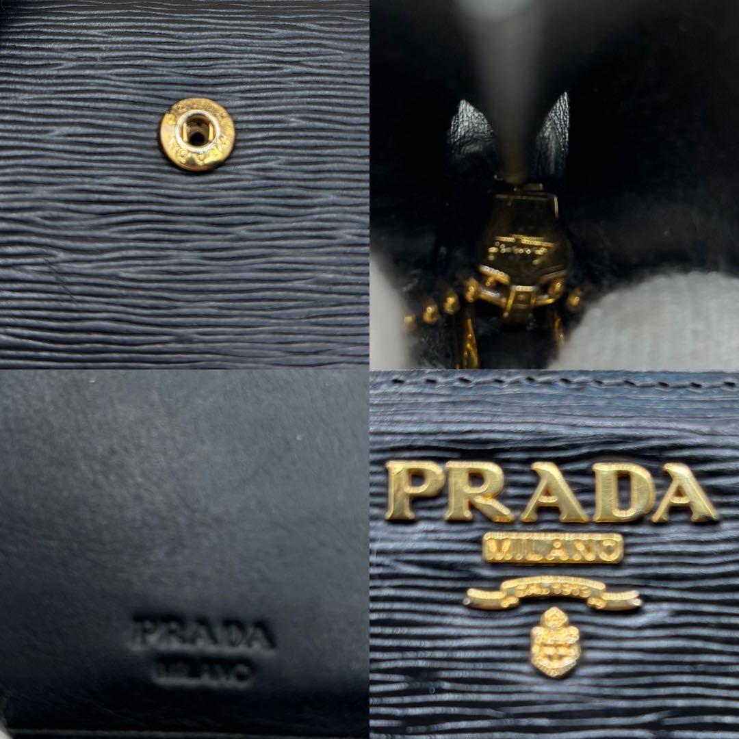 美品　プラダ✨ヴィッテロムーブ　二つ折り　金ロゴ　クロ レザー　L字ファスナー