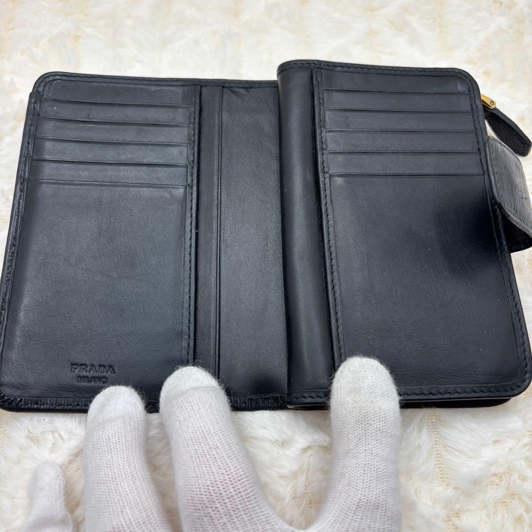 美品　プラダ✨ヴィッテロムーブ　二つ折り　金ロゴ　クロ レザー　L字ファスナー