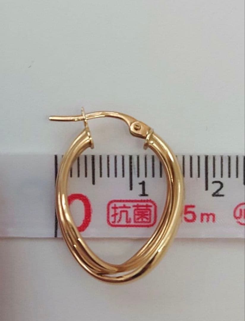 k18YG ウノアエレ　ツイストデザインフープピアス　美品