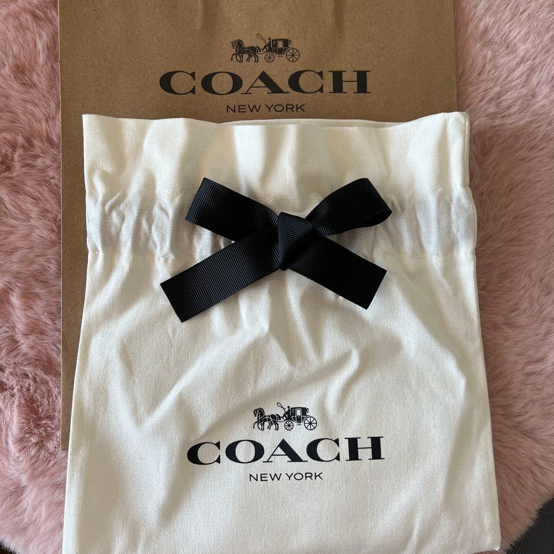 更にSALE 【新品】COACH コーチ　ホワイト　シグネチャー 二つ折り財布