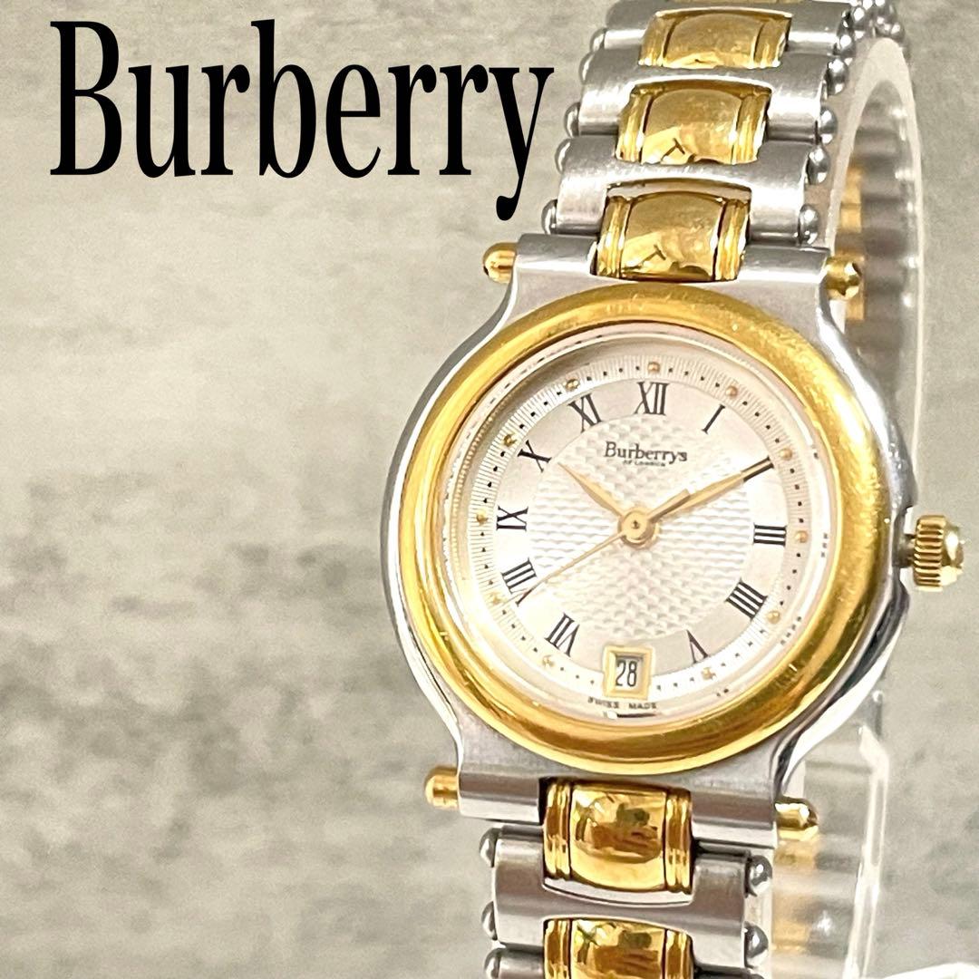 稼働品　Burberry バーバリー ゴールドベゼル　金針　デイト　腕時計