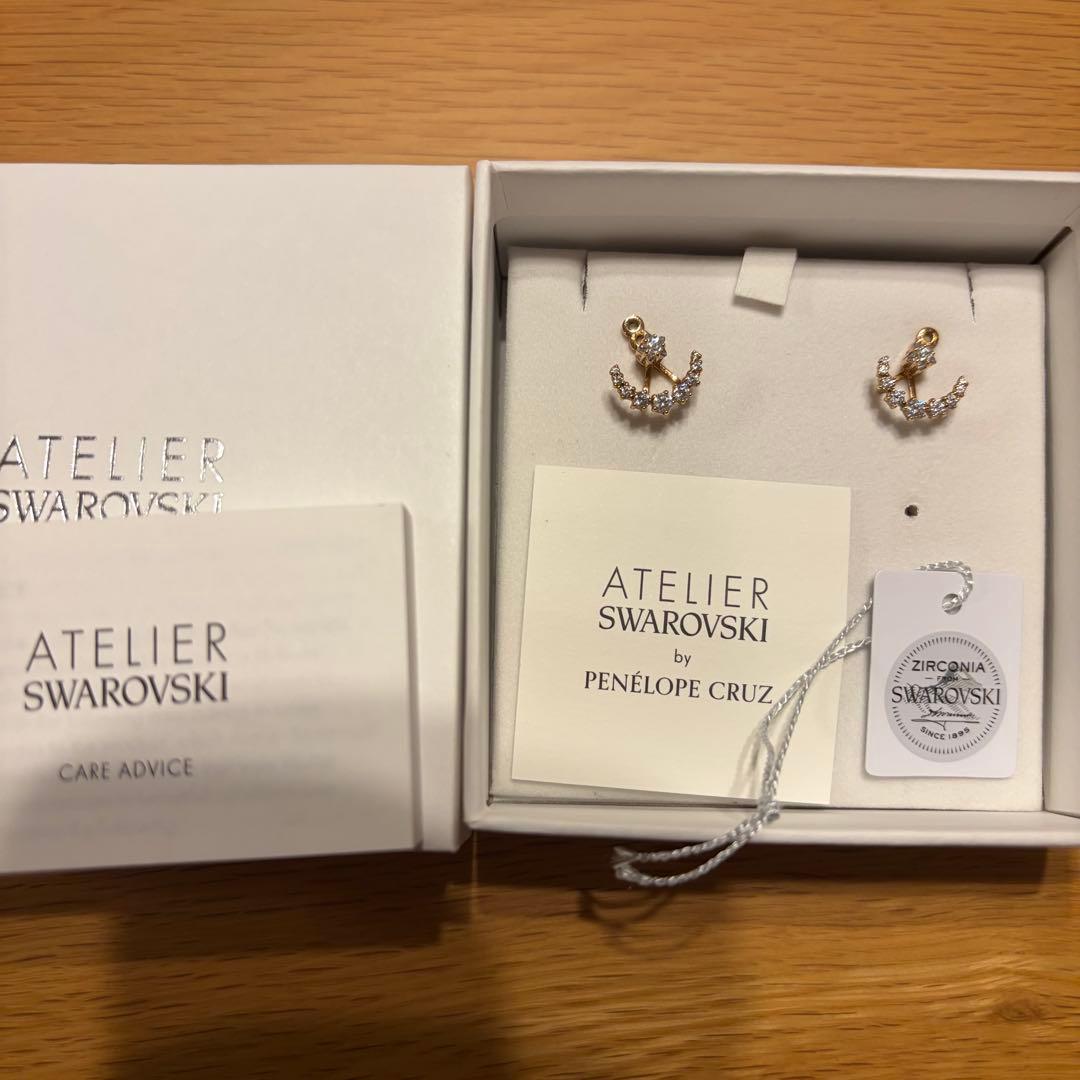 スワロフスキー MOONSUN 月 星 ピアス 愛の不時着