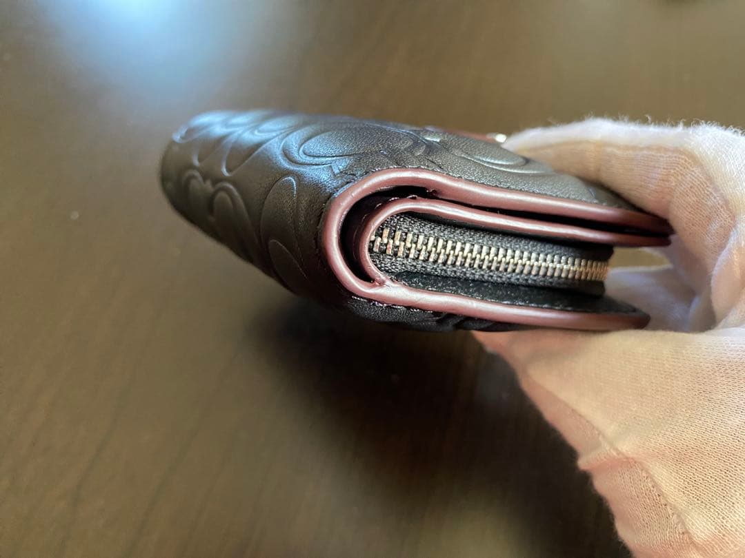 COACH エンボス加工 ブラック 二つ折り財布