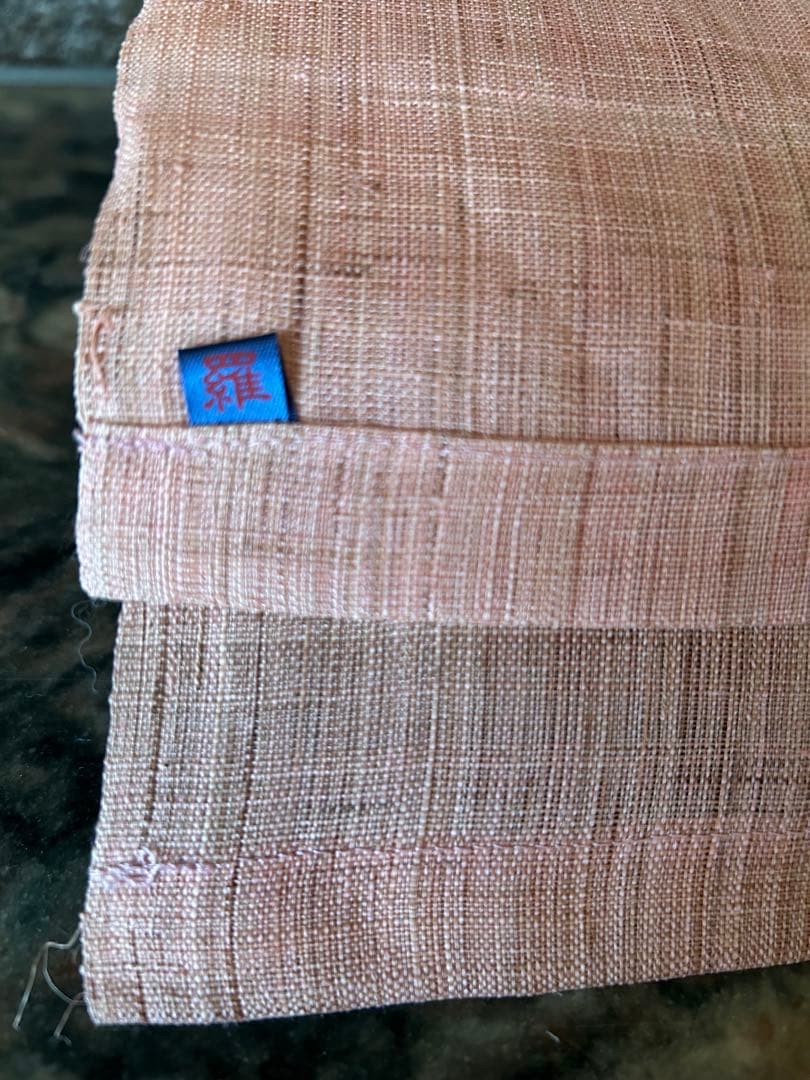 桜の花模様の薄いピンクのれん