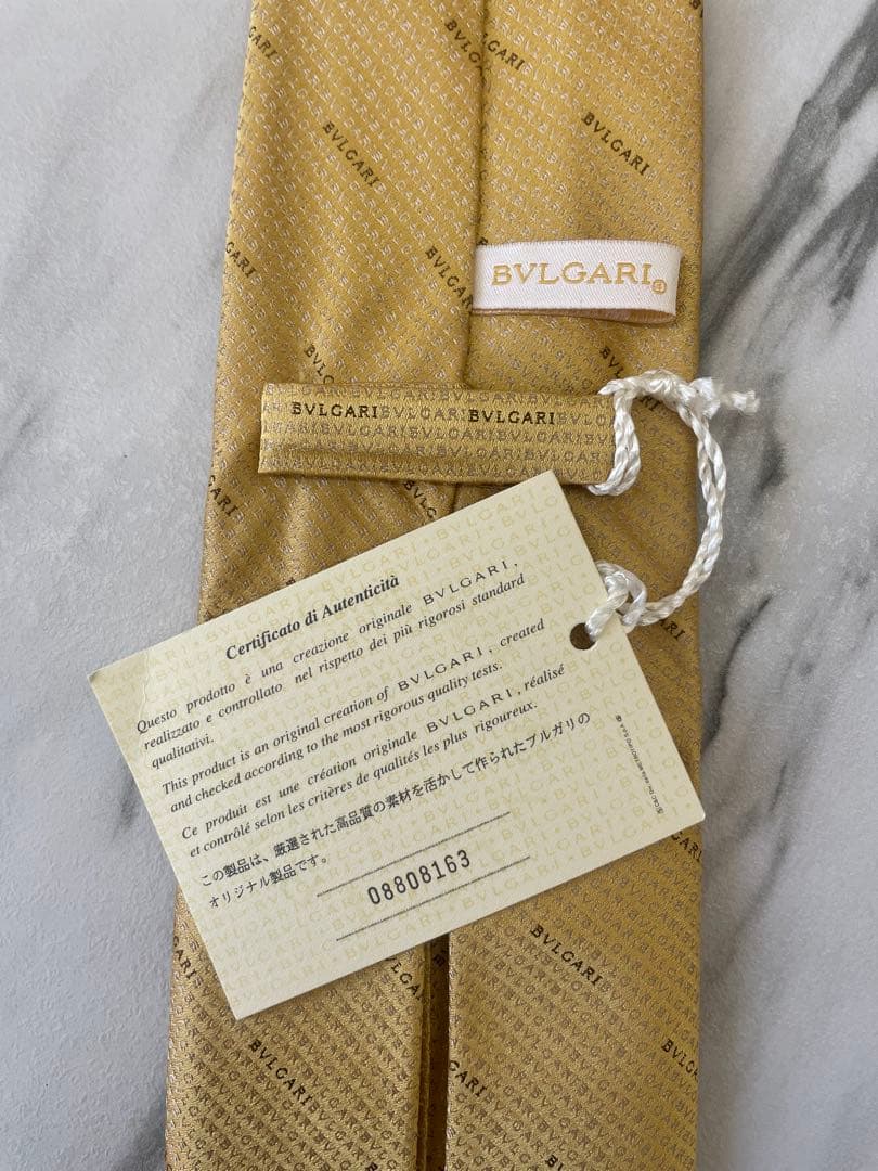 【新品箱タグ付】ブルガリ BVLGARI ロゴ総柄 ゴールド系 ネクタイ 黄色系