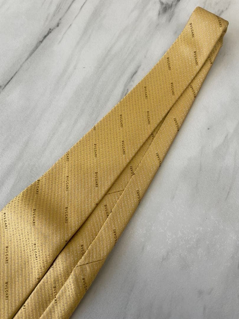 【新品箱タグ付】ブルガリ BVLGARI ロゴ総柄 ゴールド系 ネクタイ 黄色系