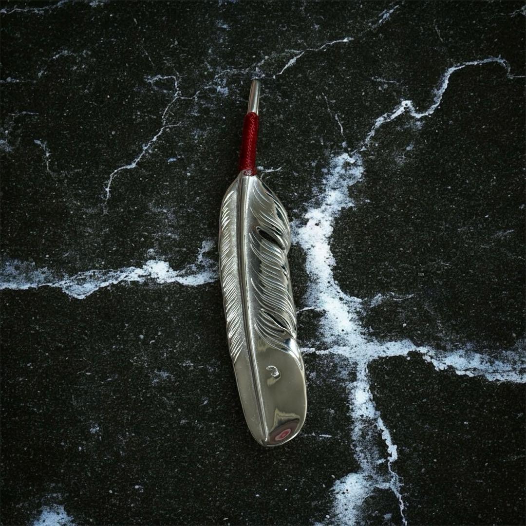 Larry smith 紐巻きフェザー左向きペンダント