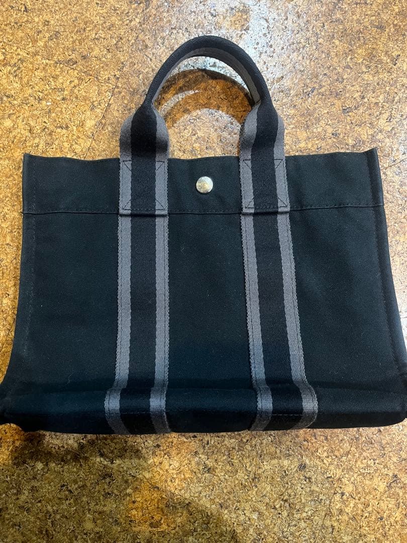 HERMES PARISブラックストライプトートバッグ