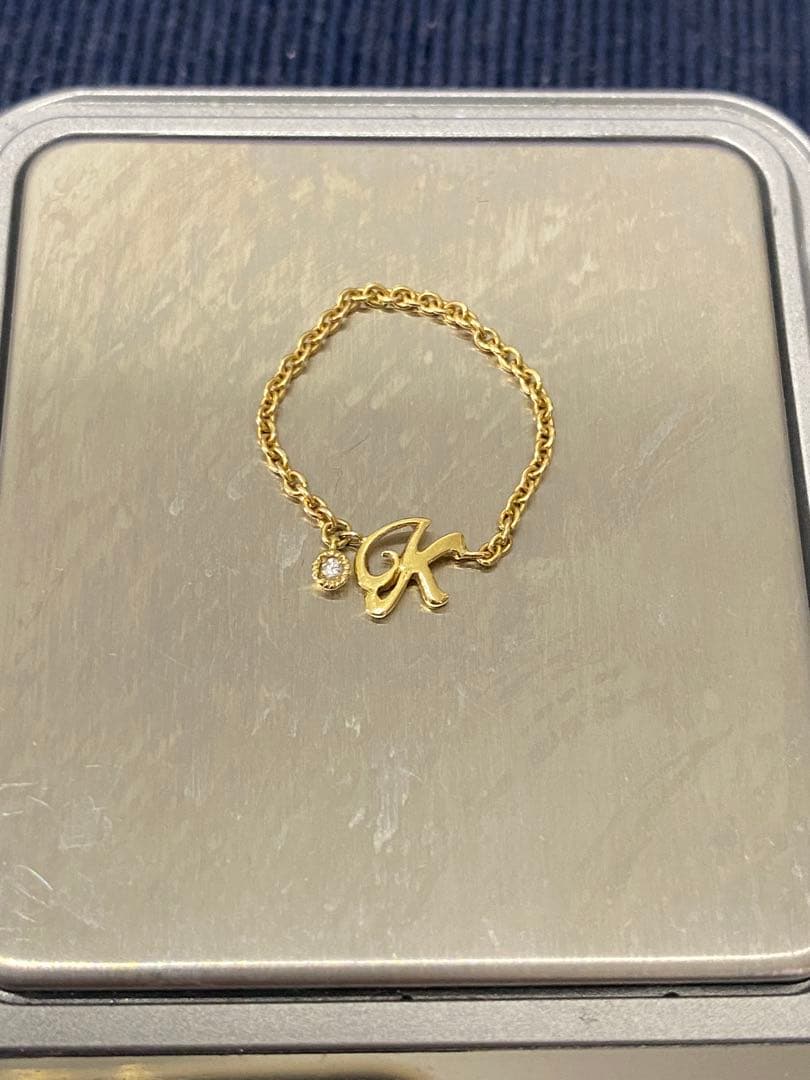 K18YGイニシャル（K）ダイヤチェーンリング　ダイヤ0.01ct 12-14号