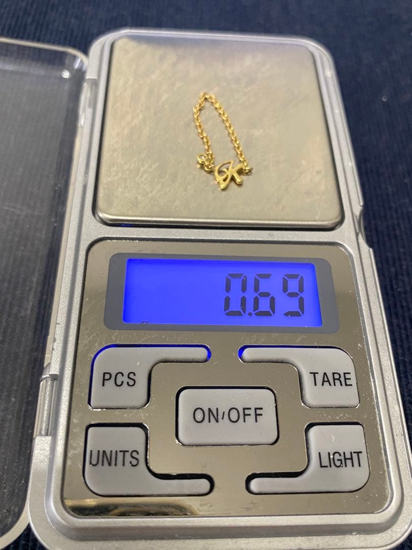 K18YGイニシャル（K）ダイヤチェーンリング　ダイヤ0.01ct 12-14号