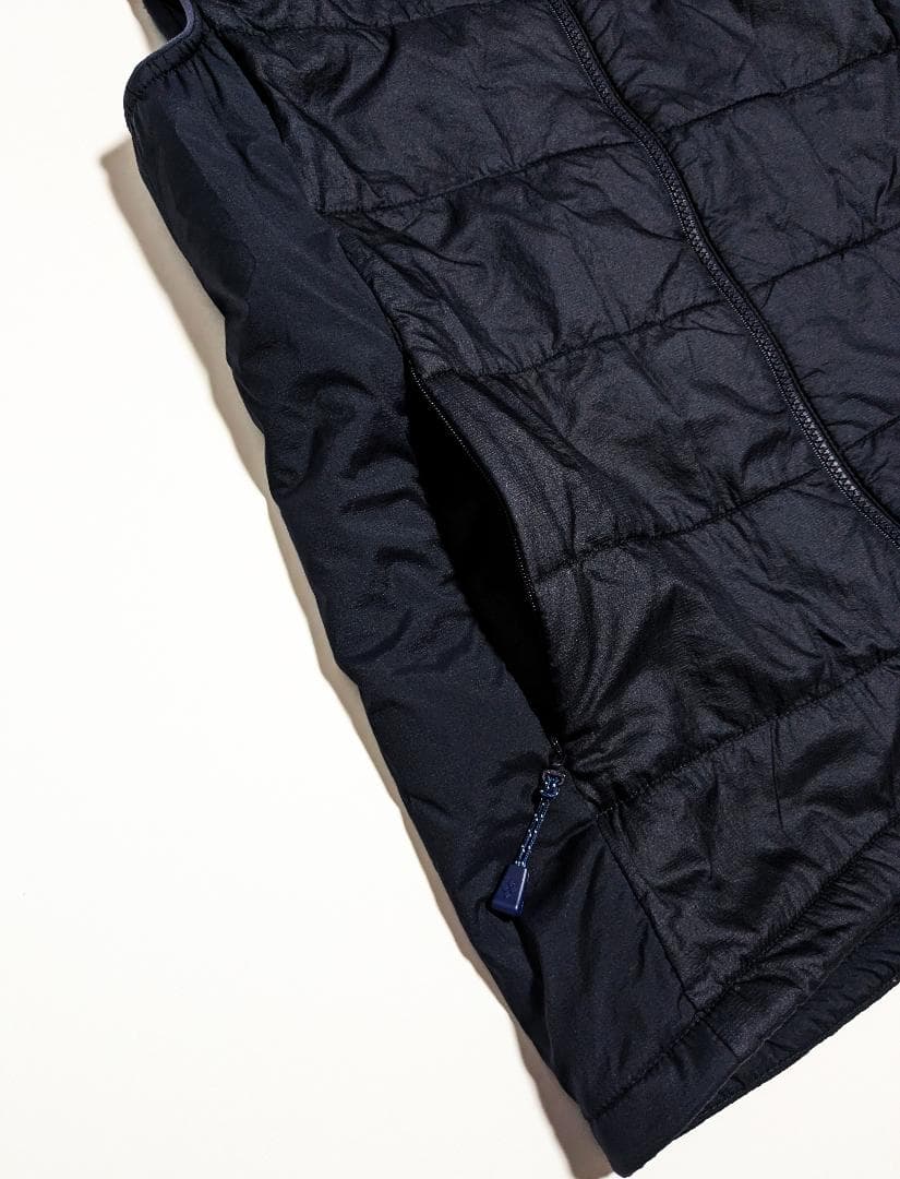 極美品 モンベル 最新／秋冬 ストレッチ U.L.サーマラップベスト 中綿ベスト