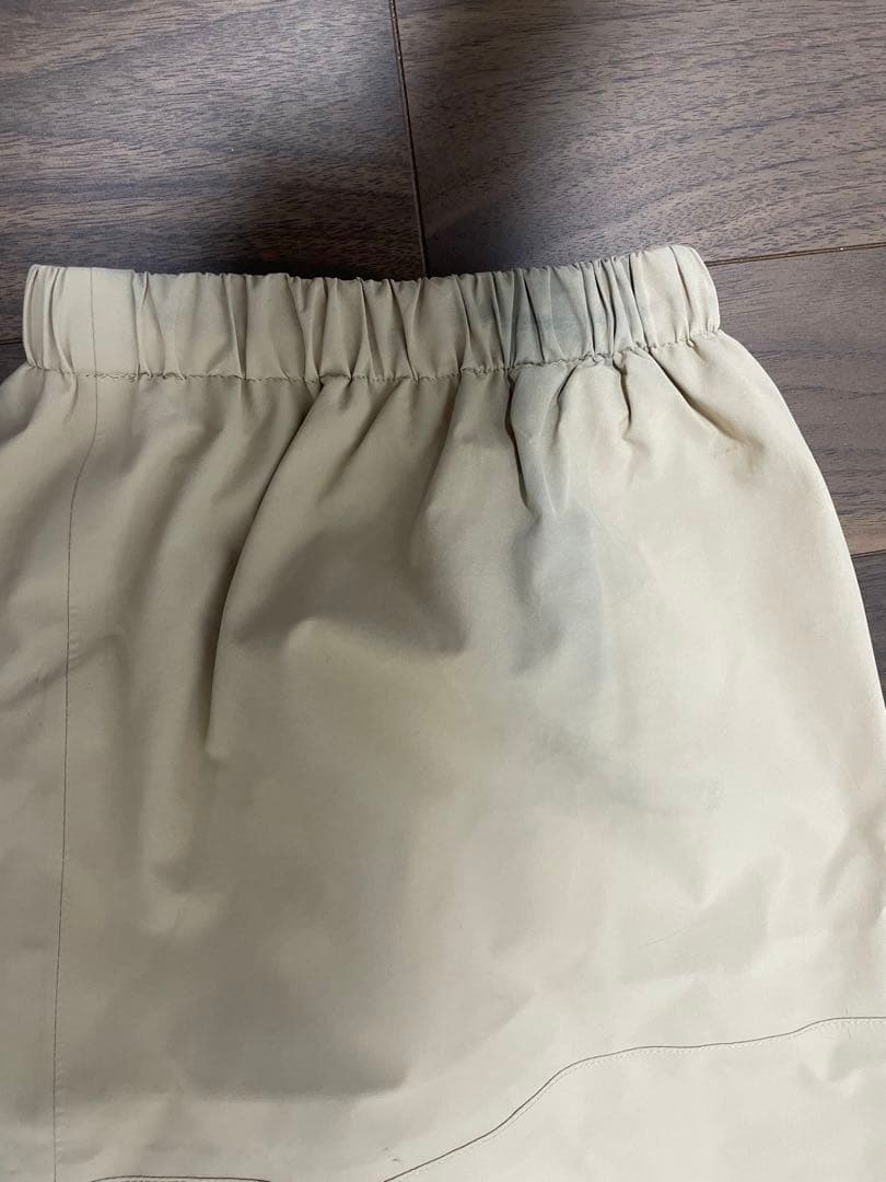 TAOTECH タオテックのコーチジャケットとベージュカーゴパンツセット