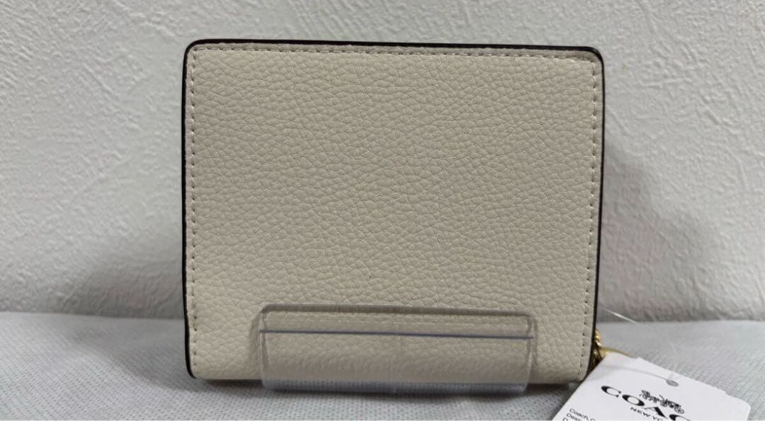 COACH 猫イラスト 二つ折り財布 ホワイト