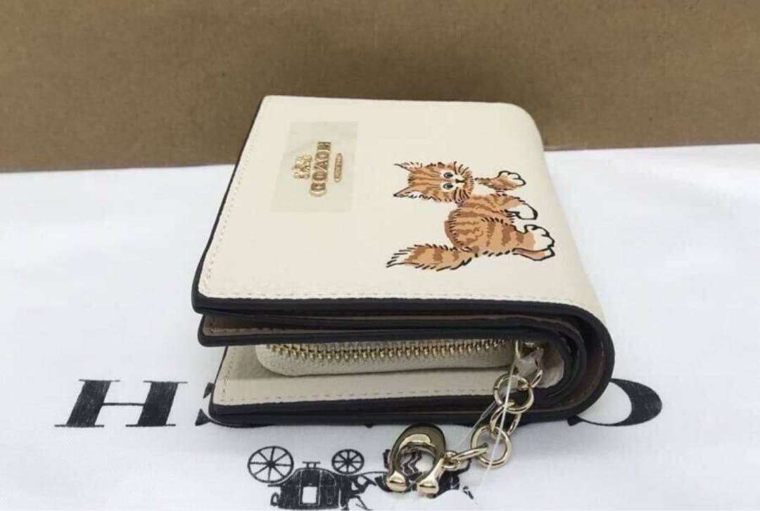 COACH 猫イラスト 二つ折り財布 ホワイト
