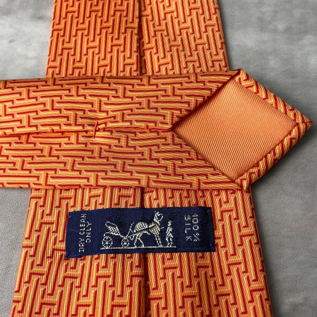 美品 HERMES エルメス H柄 総ロゴ ネクタイ オレンジ