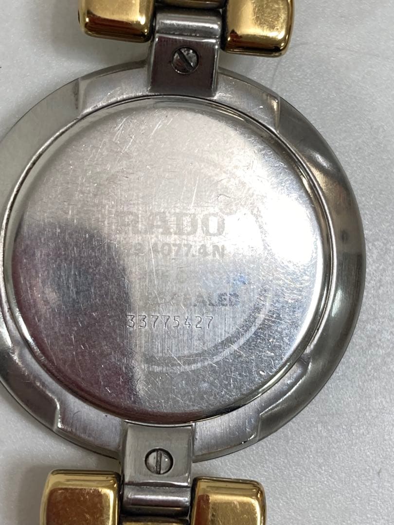 RADO ラドー　ブラック　ゴールド クォーツデイト　腕時計　稼働品