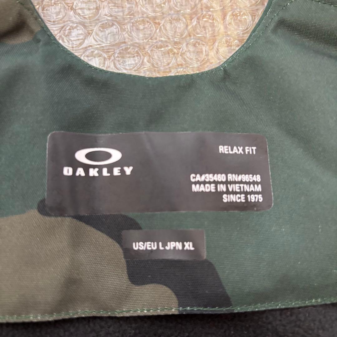 美品　オークリーOakley ビブパンツ　迷彩柄 XLスノーボードウェア　スキー