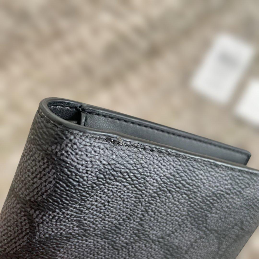 新品未使用　49,500円　COACH 二つ折り財布