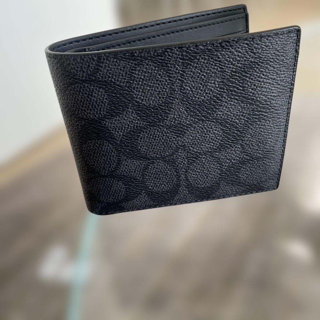 新品未使用　49,500円　COACH 二つ折り財布
