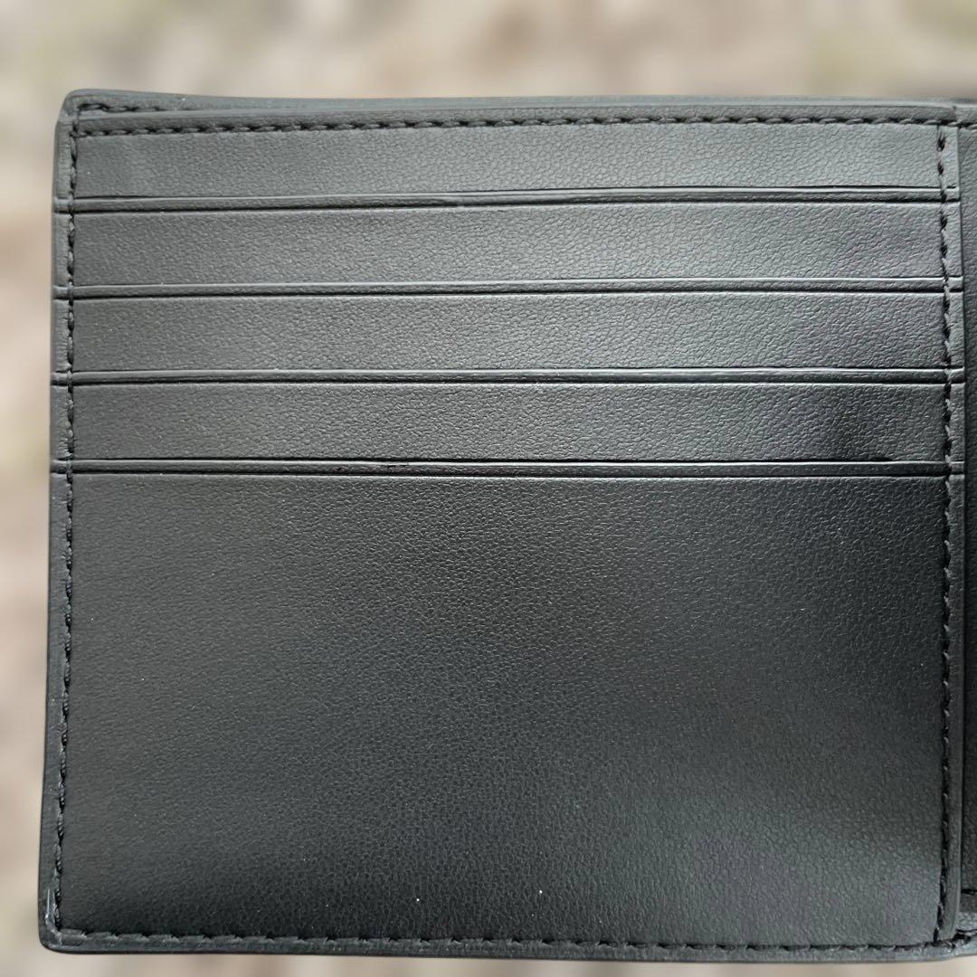 新品未使用　49,500円　COACH 二つ折り財布