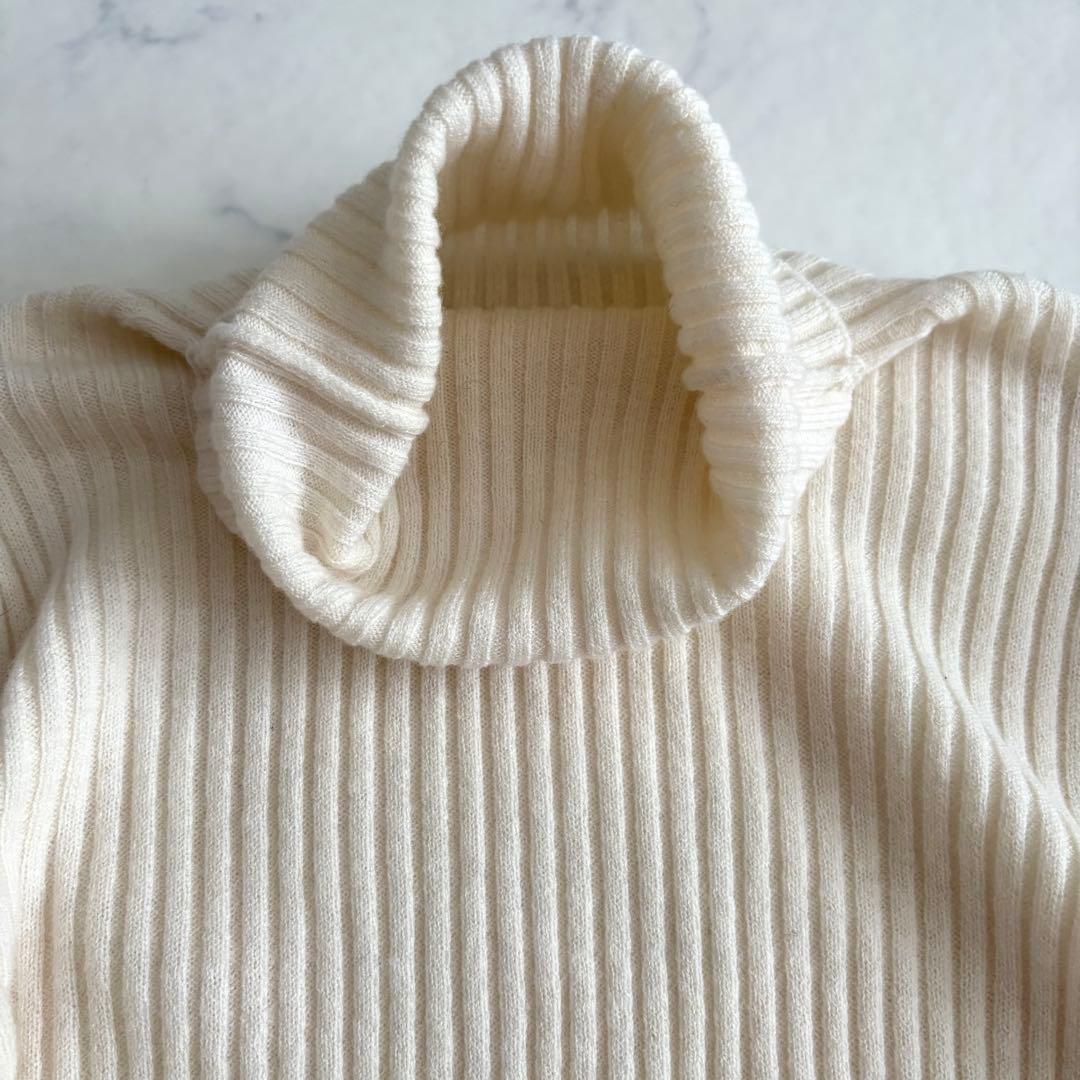 Cygne シーニュ 袖フリルタートルニット lily ホワイト