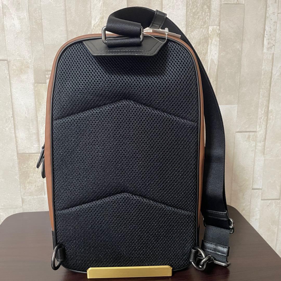 早い者勝ち！訳あり新品 COACH ボディバッグ サドル ブラウン×ブラック