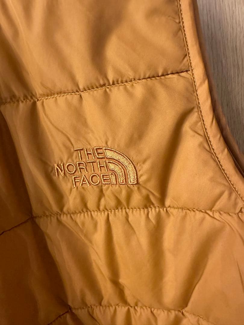 【ヤドカリ】THE NORTH FACE ダウンベスト オレンジ (S)