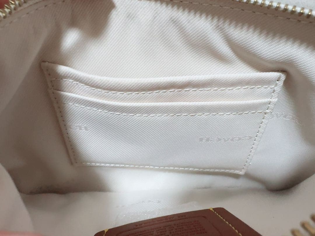 【新品・正規品】ディズニーコラボ商品 コーチ ポーチ