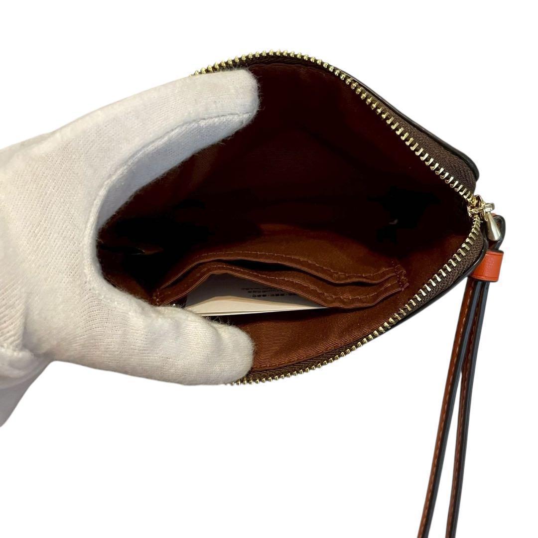 【新品】コーチ リストレット コーナージップ シグネチャー オレンジ キャンバス