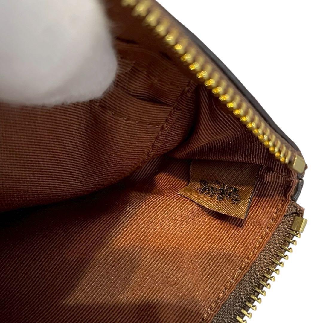 【新品】コーチ リストレット コーナージップ シグネチャー オレンジ キャンバス