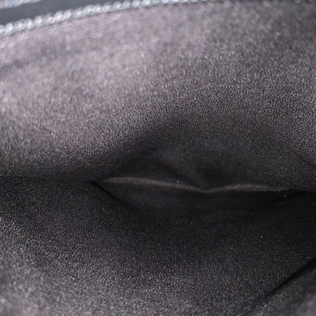 コーチ　F72220 メッセンジャーバック　エンボス　シグネチャー　レザー　黒