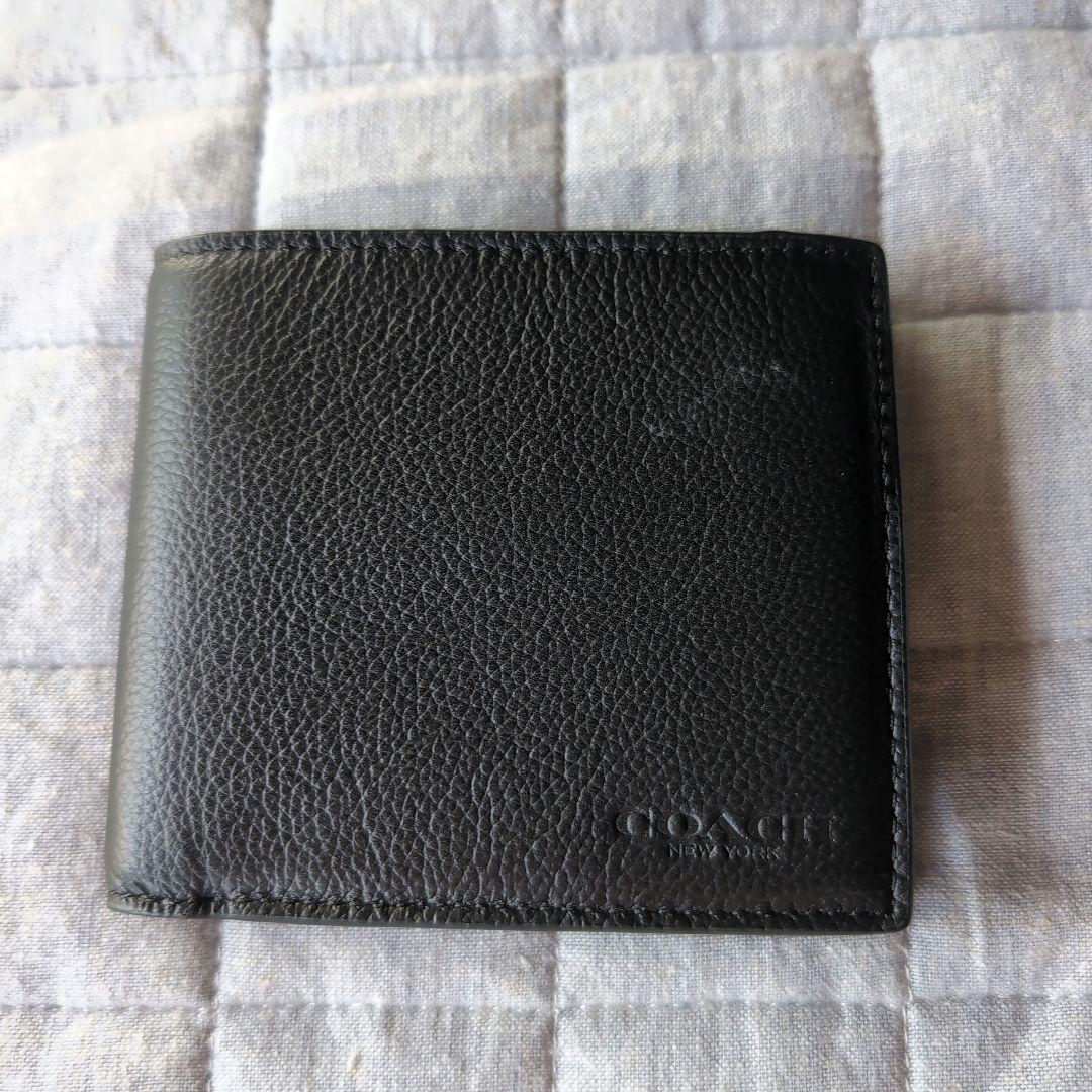 COACHコーチシグネチャーシンプルブラック二つ折り財布【新品未使用】　傷あり
