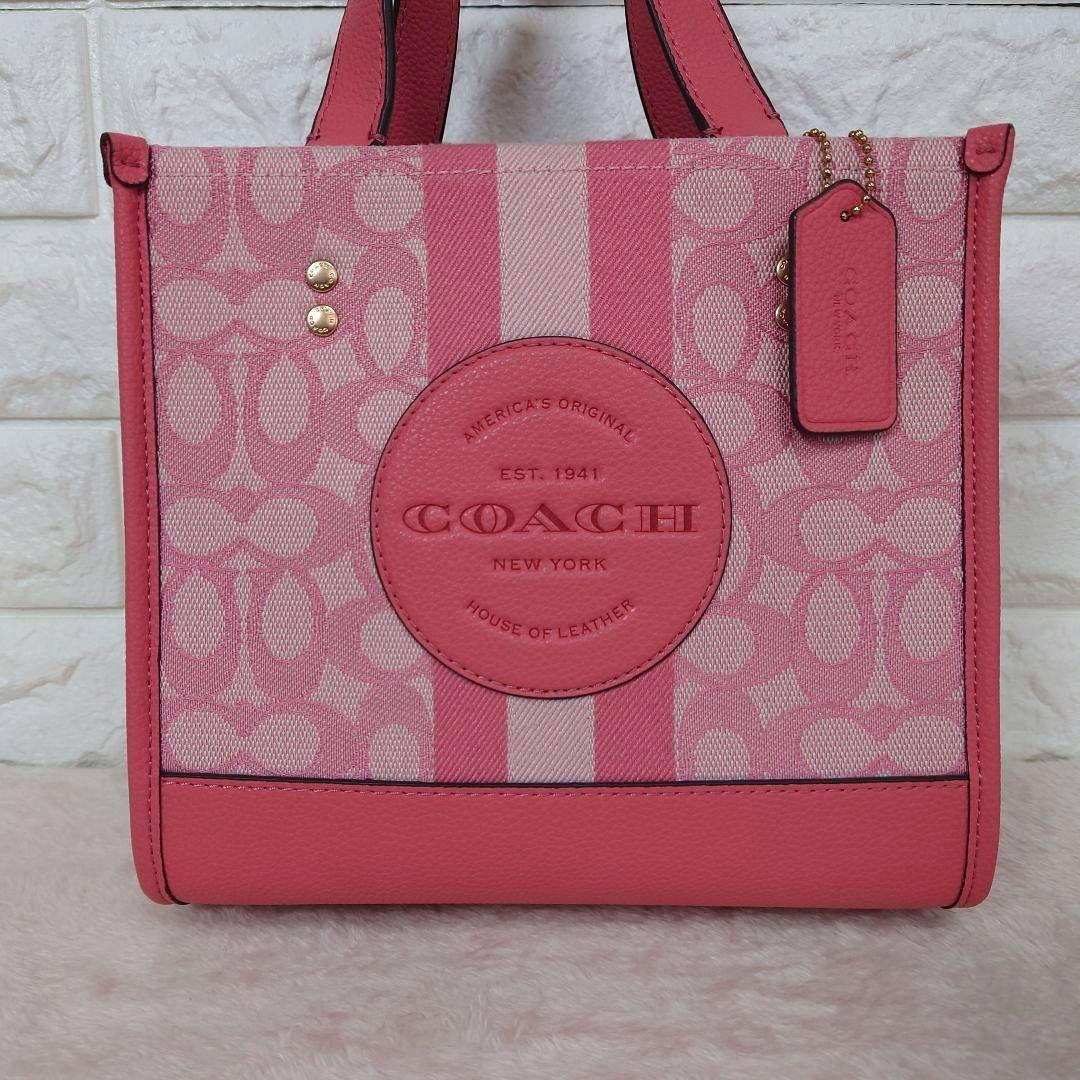 バッグ COACH Dempsey totebag Signature pink